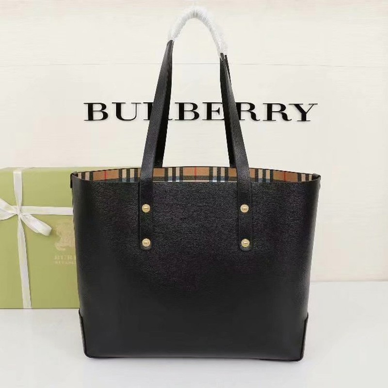 Burberry Embossed Crest Leather Tote In Black