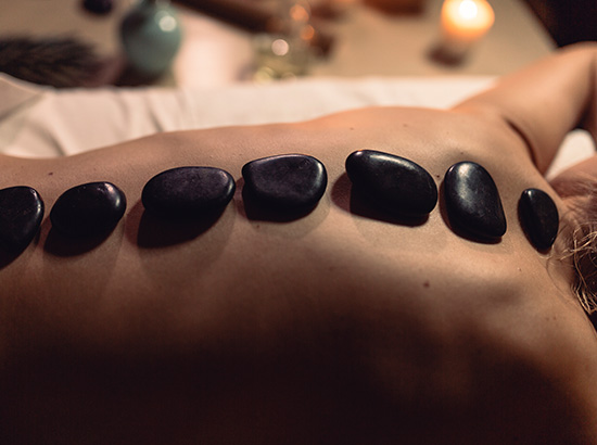 Hot Stone Massage In Abu Dhabi | Men's Stone Massage Near Me